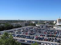 a large parking lot filled with lots of cars at Kyriad Marne-La-Vallée Torcy in Torcy