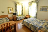 Posteľ alebo postele v izbe v ubytovaní Hotel Tirreno