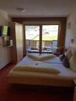 Posteľ alebo postele v izbe v ubytovaní Hotel Garni Alpendiamant