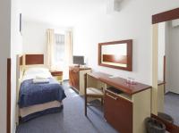 Postel nebo postele na pokoji v ubytování Hotel Atos