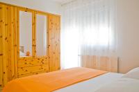 Posteľ alebo postele v izbe v ubytovaní Apartment Annika