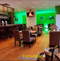 Εστιατόριο ή άλλο μέρος για φαγητό στο Modernes Harz Studio Apartment Ferienwohnung über den Baumspitzen