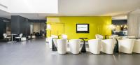 A seating area at Ilunion Bel-Art