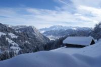 a snow covered cabin on top of a snow covered mountain at Cabane entre terre et ciel in Saint-Nicolas-la-Chapelle