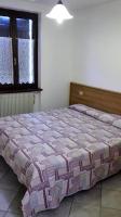 Posteľ alebo postele v izbe v ubytovaní Pinzolocasa