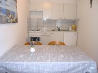 Kuchyň nebo kuchyňský kout v ubytování Apartmani Dolencic