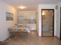 Kuchyň nebo kuchyňský kout v ubytování Apartmani Dolencic