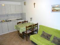 Kuchyň nebo kuchyňský kout v ubytování Apartmani Dolencic