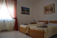 A bed or beds in a room at Pietro & Graziella