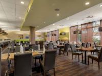 En restaurant eller et andet spisested på Mercure Hotel Hamburg am Volkspark