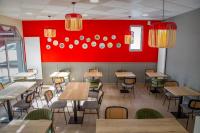 En restaurant eller et andet spisested på B&B HOTEL Lorient Ploemeur