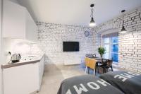 Televízia a/alebo spoločenská miestnosť v ubytovaní Homewell Apartments Wilson Park