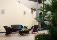 Zona de estar de Hotel Villa Carolina