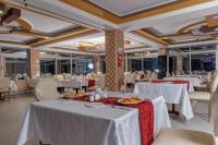 En restaurant eller et andet spisested på Isiolo Landmark Hotel