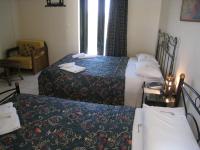 A bed or beds in a room at Castle View Studios