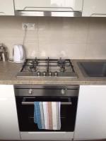 Kuchyňa alebo kuchynka v ubytovaní Apartman Elena