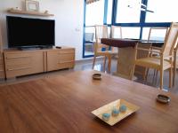 Televízia a/alebo spoločenská miestnosť v ubytovaní ApartUP Patacona Panoramic