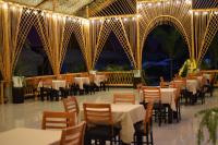 En restaurant eller et andet spisested på Hotel Tulumayo Lodge