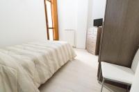 Posteľ alebo postele v izbe v ubytovaní Casa Roncalli