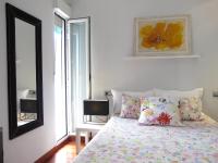 Łóżko lub łóżka w pokoju w obiekcie Principe Santa Ana Madrid Centro