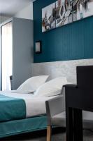 Ein Bett oder Betten in einem Zimmer der Unterkunft H&ocirc;tel Le Bristol Strasbourg Gare
