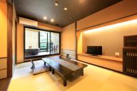 箱根水明荘にあるテレビまたはエンターテインメントセンター