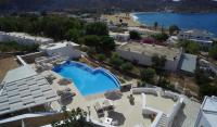 an aerial view of a resort with a swimming pool and a beach at Galaxy Hotel in Mylopotas