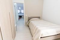 Posteľ alebo postele v izbe v ubytovaní Casa Roncalli