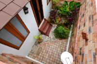 an overhead view of a porch with a door and plants at PingChan Koh Phangan Beachfront Resort in Thong Nai Pan Yai