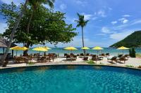 a swimming pool with chairs and umbrellas on the beach at PingChan Koh Phangan Beachfront Resort in Thong Nai Pan Yai