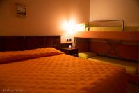 Posteľ alebo postele v izbe v ubytovaní Hotel Pina Ristorante