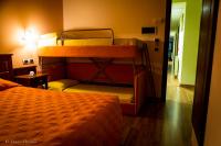 Posteľ alebo postele v izbe v ubytovaní Hotel Pina Ristorante