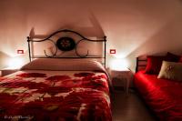 Posteľ alebo postele v izbe v ubytovaní Hotel Pina Ristorante