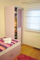 Postel nebo postele na pokoji v ubytování Apartmani Špoljar