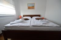 Postel nebo postele na pokoji v ubytování Apartmani Špoljar
