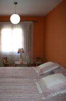 Postel nebo postele na pokoji v ubytování La Casa del Reloj