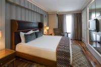 Postel nebo postele na pokoji v ubytování Titanic City Taksim