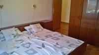 Łóżko lub łóżka w pokoju w obiekcie Apartments Zambratija