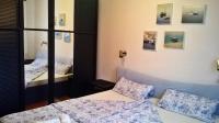 Łóżko lub łóżka w pokoju w obiekcie Apartments Zambratija