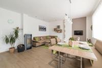 Televízia a/alebo spoločenská miestnosť v ubytovaní Ferienwohnung Eder