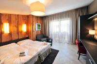 Televízia a/alebo spoločenská miestnosť v ubytovaní Via Jasna Wellness Apartments