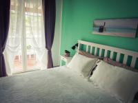 Posteľ alebo postele v izbe v ubytovaní B&B La Rosa dei Venti
