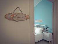 Posteľ alebo postele v izbe v ubytovaní B&B La Rosa dei Venti