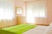Posteľ alebo postele v izbe v ubytovaní Apartment Annika