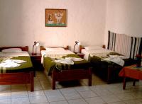 A bed or beds in a room at Summer Lodge