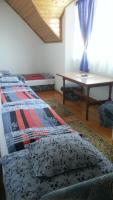 Posteľ alebo postele v izbe v ubytovaní Csokonai guesthouse