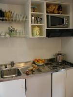 A kitchen or kitchenette at Le Ginestre Arte Vacanze