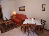 A seating area at Le Ginestre Arte Vacanze
