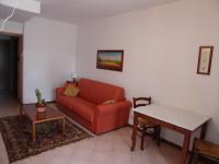 A seating area at Le Ginestre Arte Vacanze