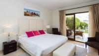 Postel nebo postele na pokoji v ubytování Coral Beach Aparthotel